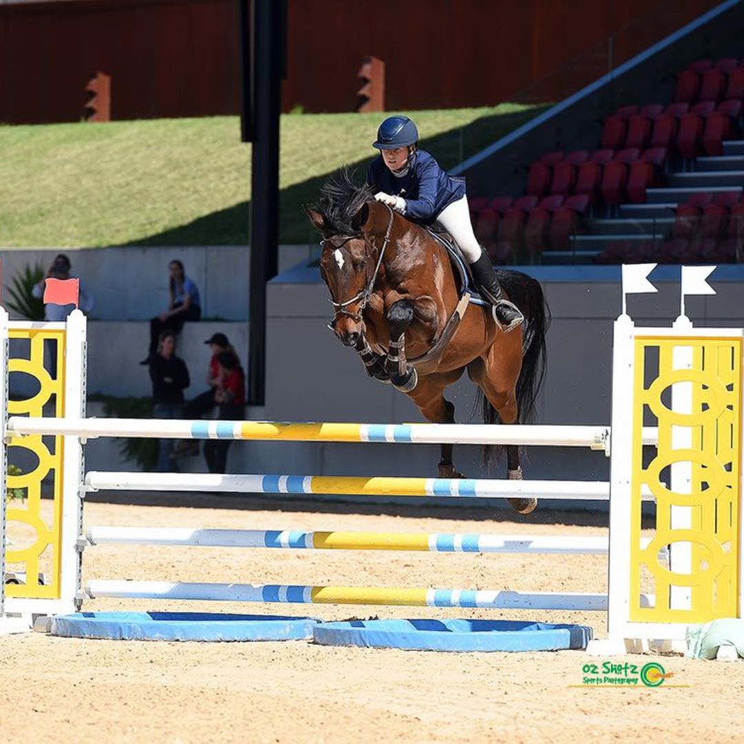 Sponsored Rider Charly Robinson competing in Showjumping at an equestrian event