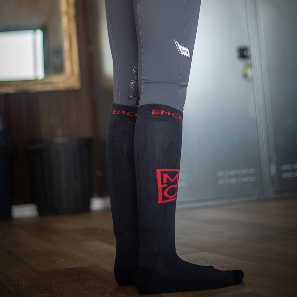 Emcee Apparel's black Bamboo socks with red logo