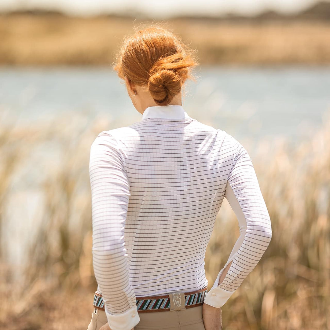 Equestrian model facing away from the camera wearing Emcee Apparel's Cantika in white