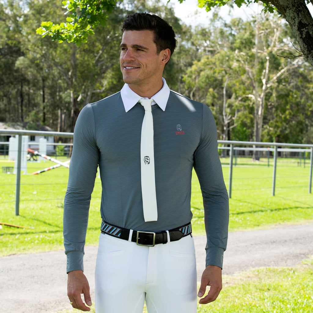 An equestrian model wearing the Balck Marco shirt by Emcee Apparel